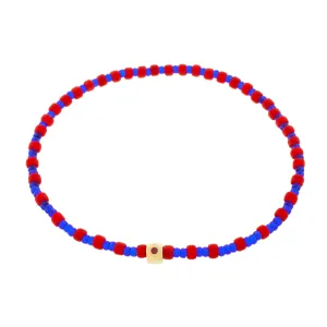 Flat Tetra with a Ruby on a Red & Blue Beaded Bracelet