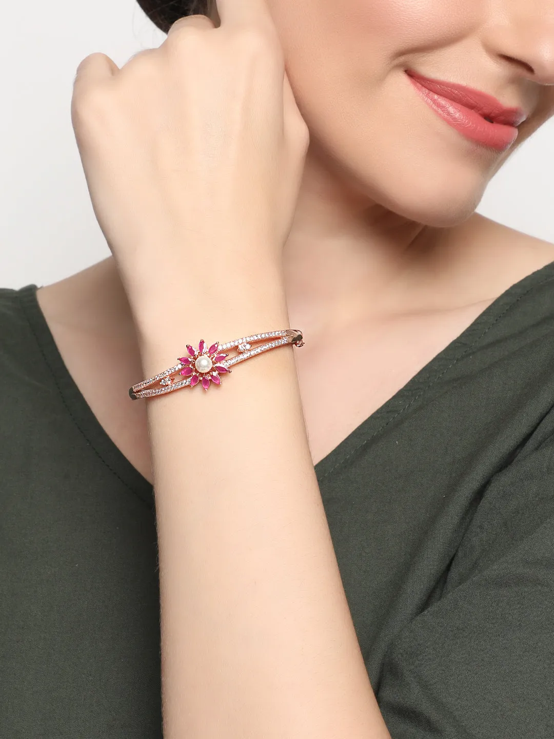 Jazz And Sizzle Rose Gold Plated American Diamond Ruby Studded Floral Patterned Bracelet