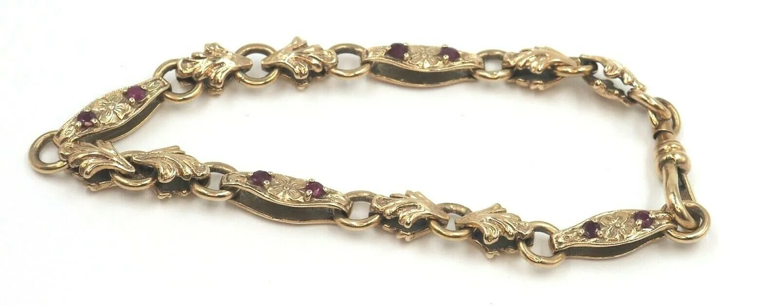 Ruby 9ct Yellow Gold Bracelet with Fleur de lis & Flower Patterned Links