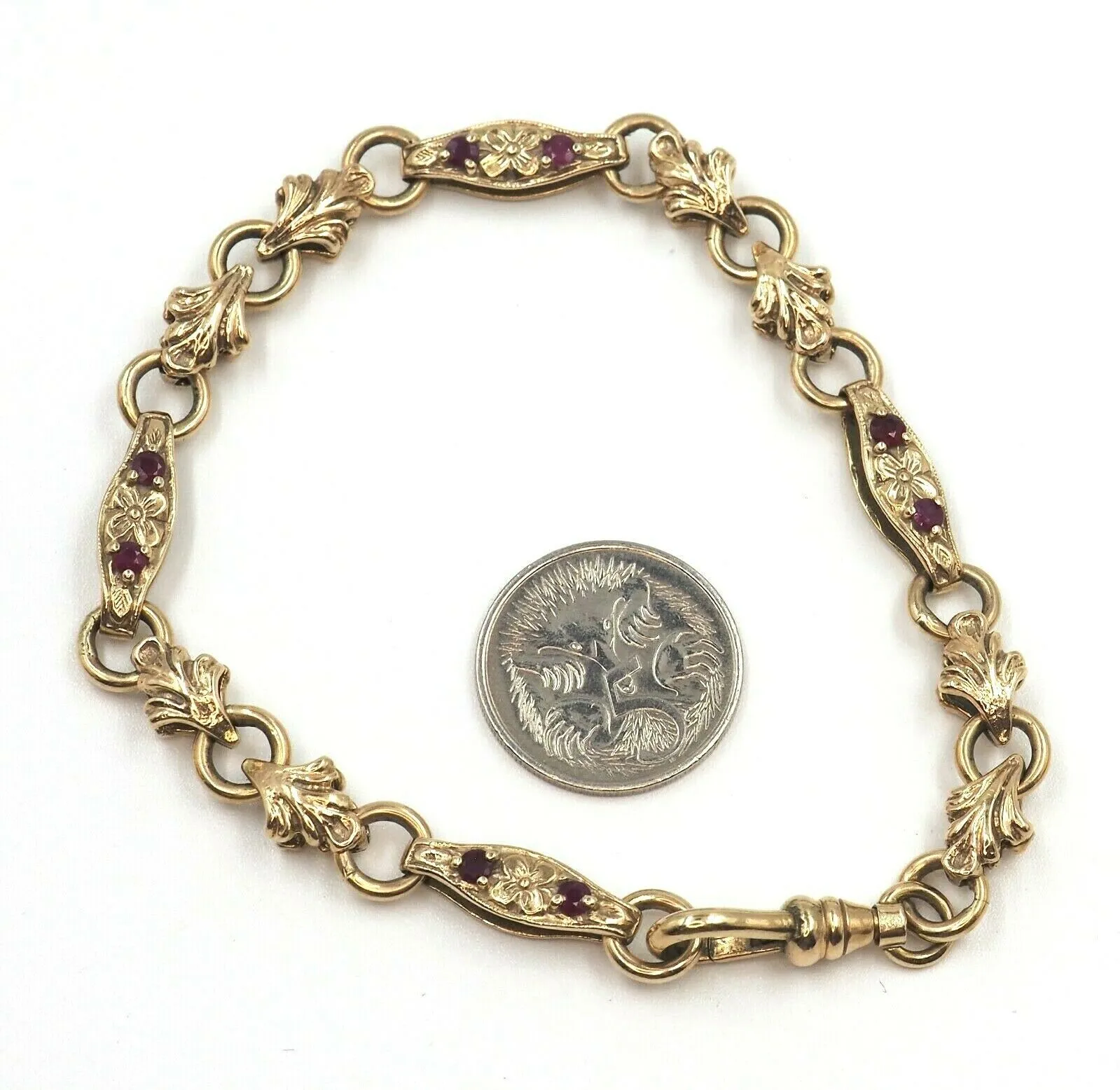 Ruby 9ct Yellow Gold Bracelet with Fleur de lis & Flower Patterned Links