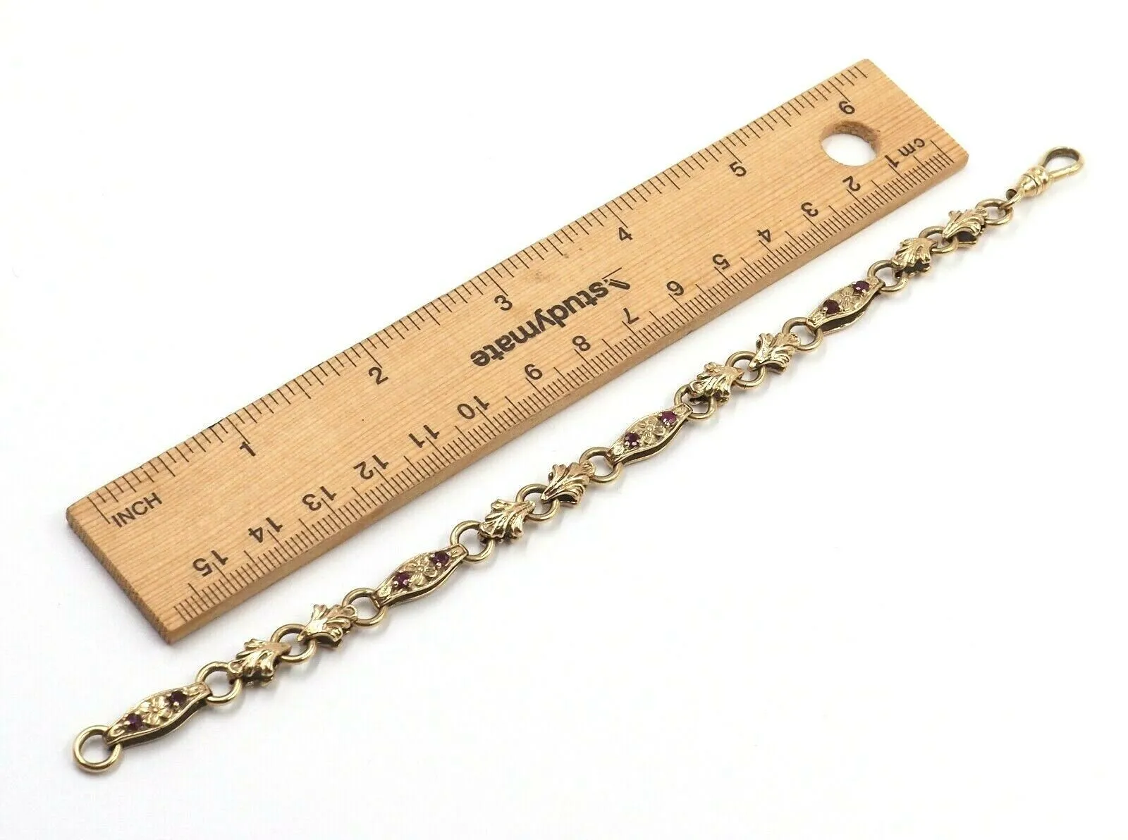 Ruby 9ct Yellow Gold Bracelet with Fleur de lis & Flower Patterned Links